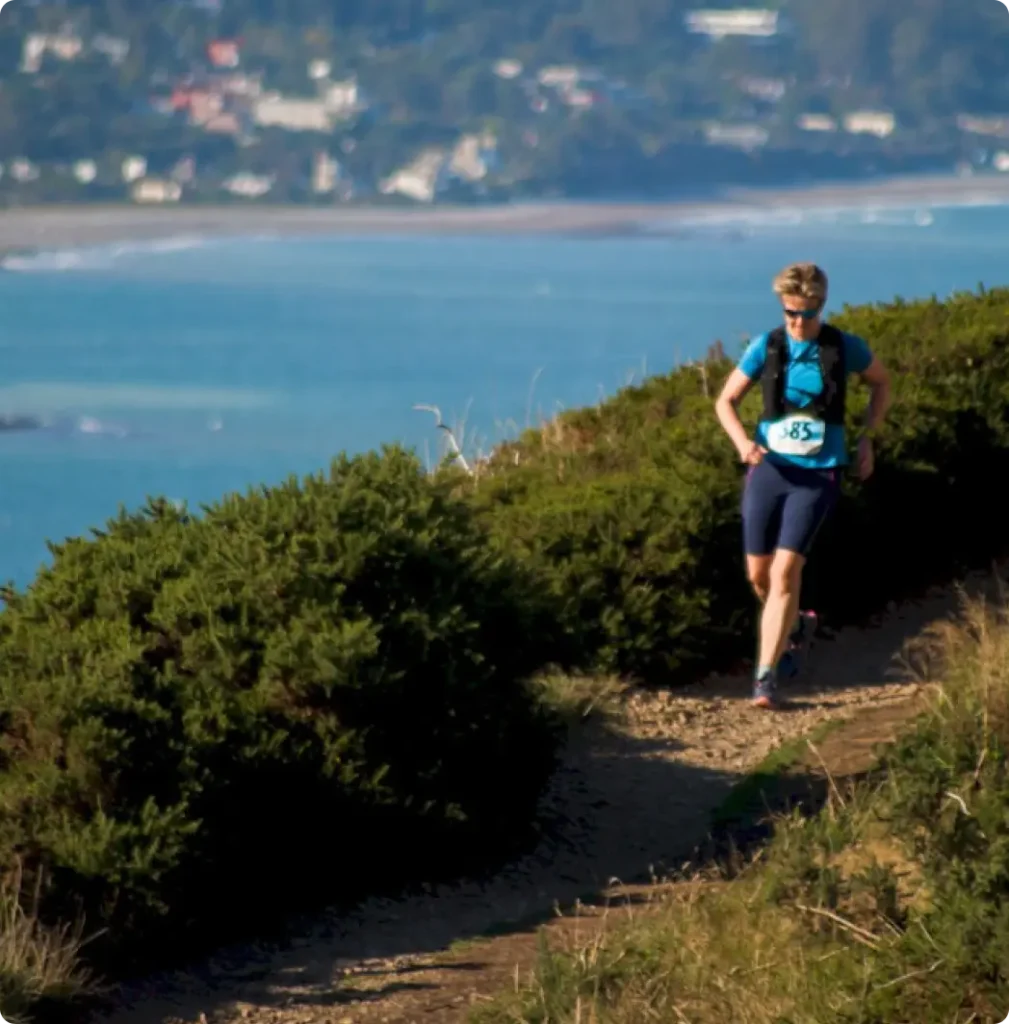 woman running on coastline