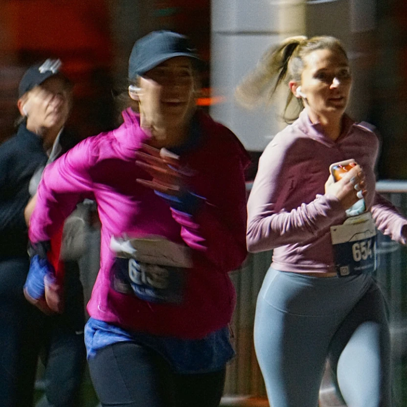 two women running